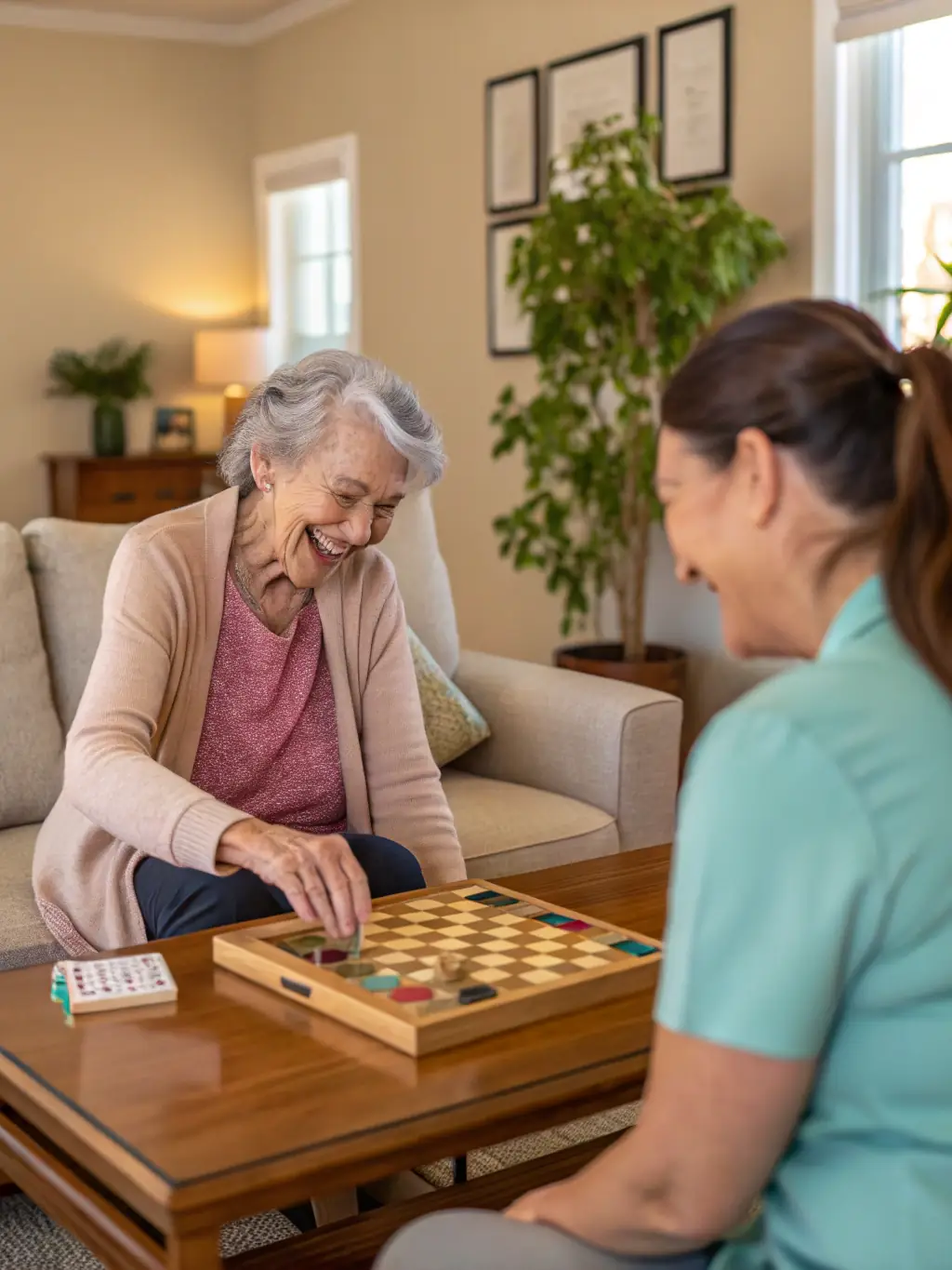 A patient smiling while playing a board game with a volunteer, illustrating the fun and engaging recreational activities offered.